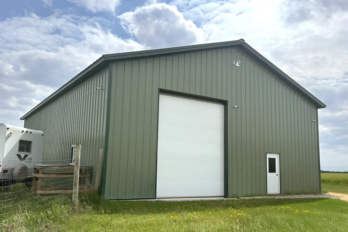 Lester pole barn with living quarters inside.