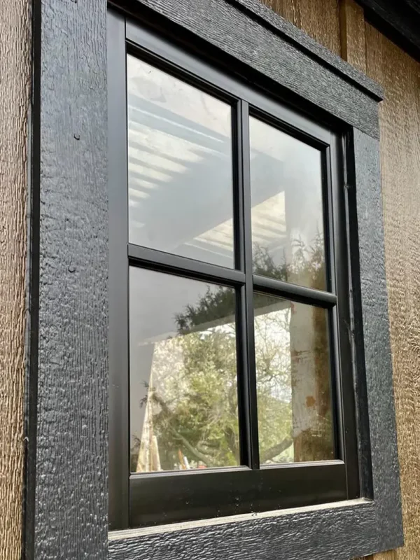 Exterior trim of a window completed on a building remodel.